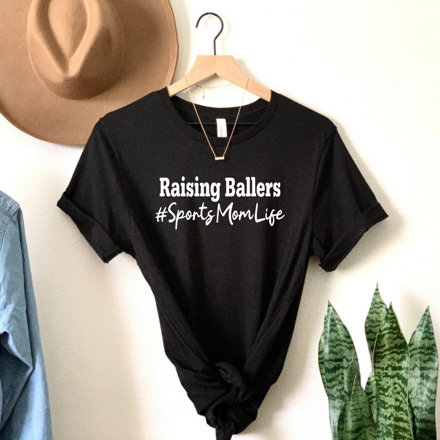 Celebrate the Sports Mom Saga: Raising Ballers Tee