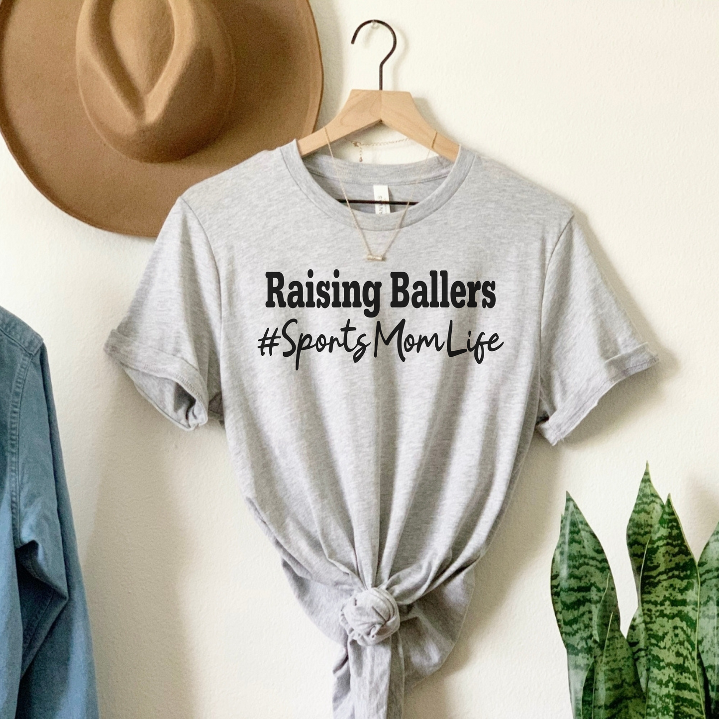 Celebrate the Sports Mom Saga: Raising Ballers Tee