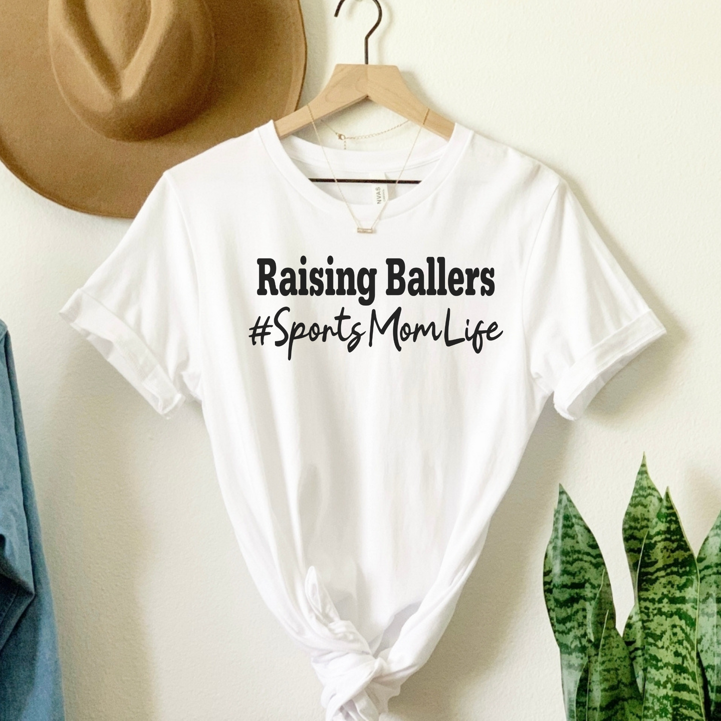 Celebrate the Sports Mom Saga: Raising Ballers Tee